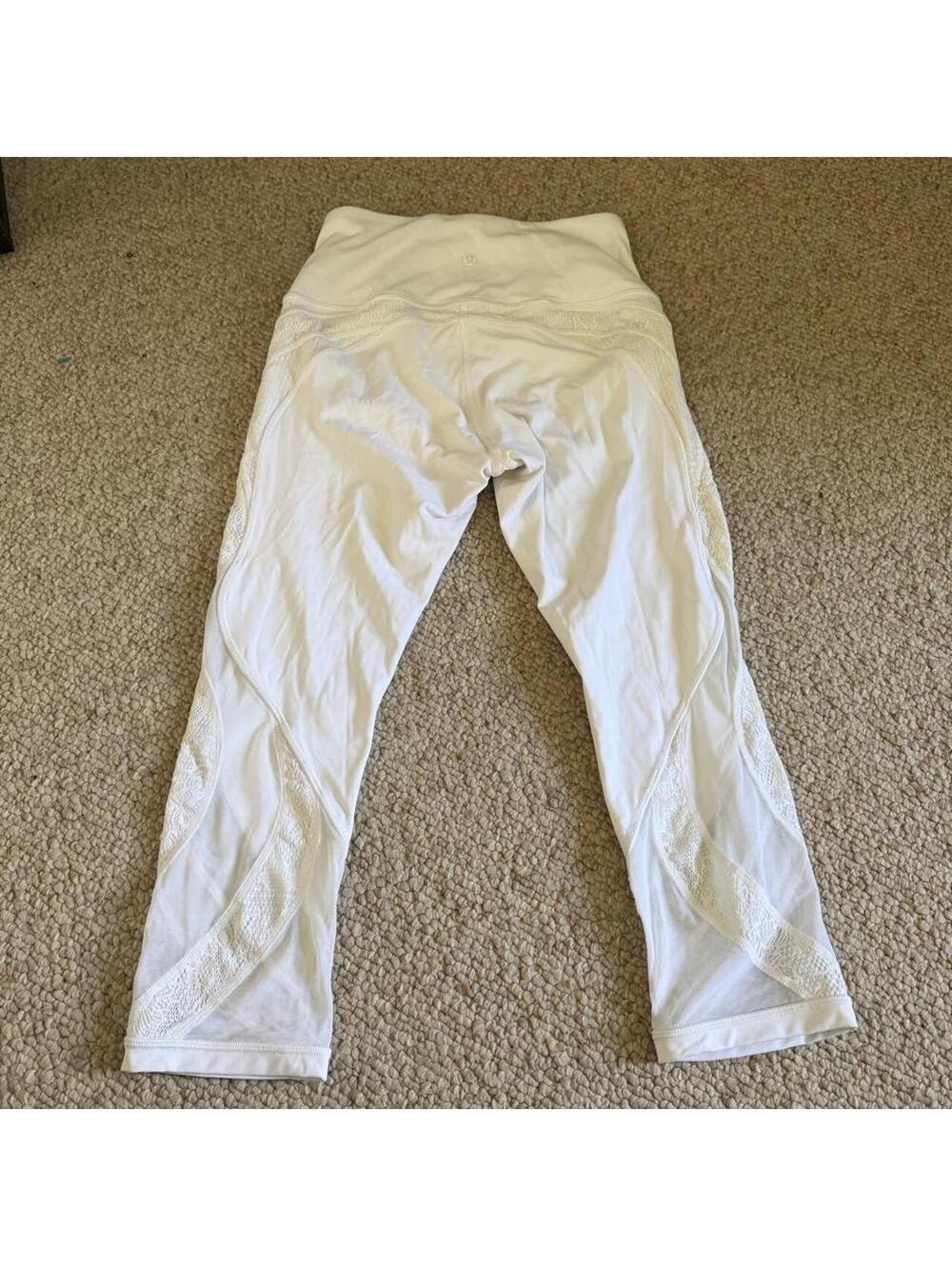 White Lululemon capri leggings with mesh panels